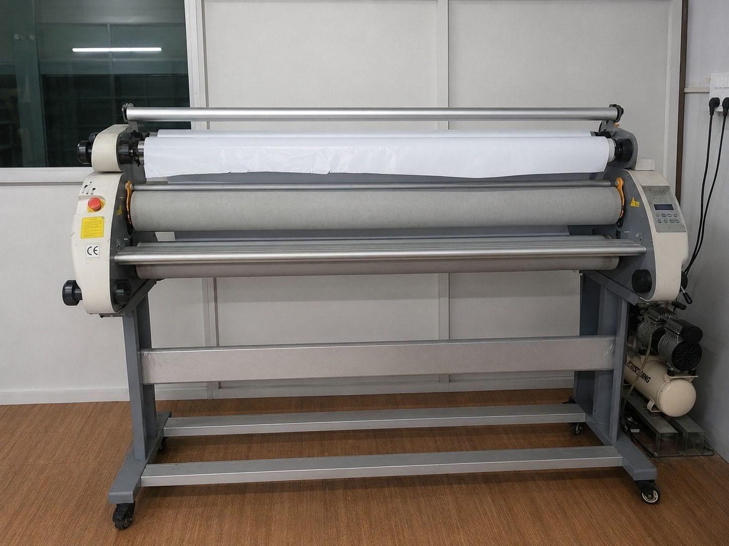 AQSA Prints wide-format vinyl lamination and finishing